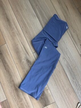 Alo Yoga Softsculpt Foldover Flare Legging in infinity blue color - gently worn